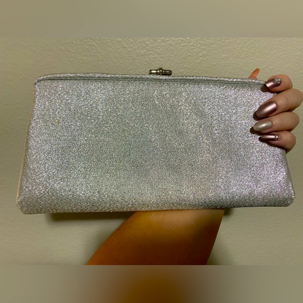 Barely used Womens sparkly silver clutch -